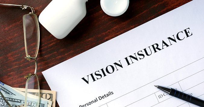vision insurance form on desk next to reading glasses and cash