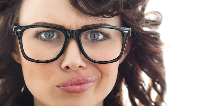 unhappy woman with glasses