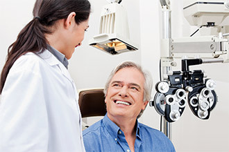 Older man getting an eye exam