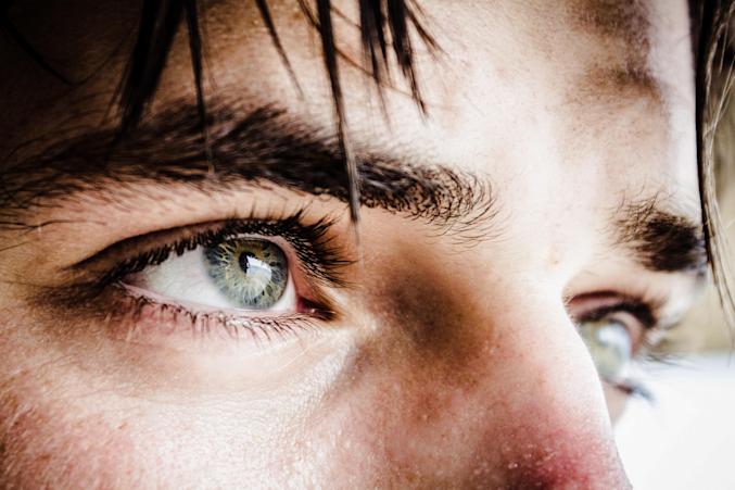 young man with green eye