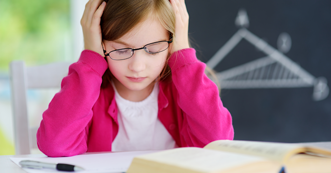 girl frustrated while reading