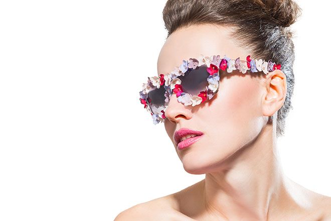Woman wearing floral sunglasses