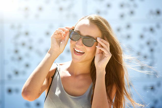Woman wearing wayfarer sunglasses