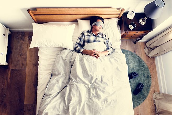 Man sleeping in bed