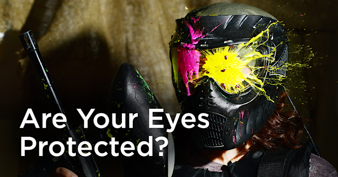 Paint baller with paint splattered on their mask