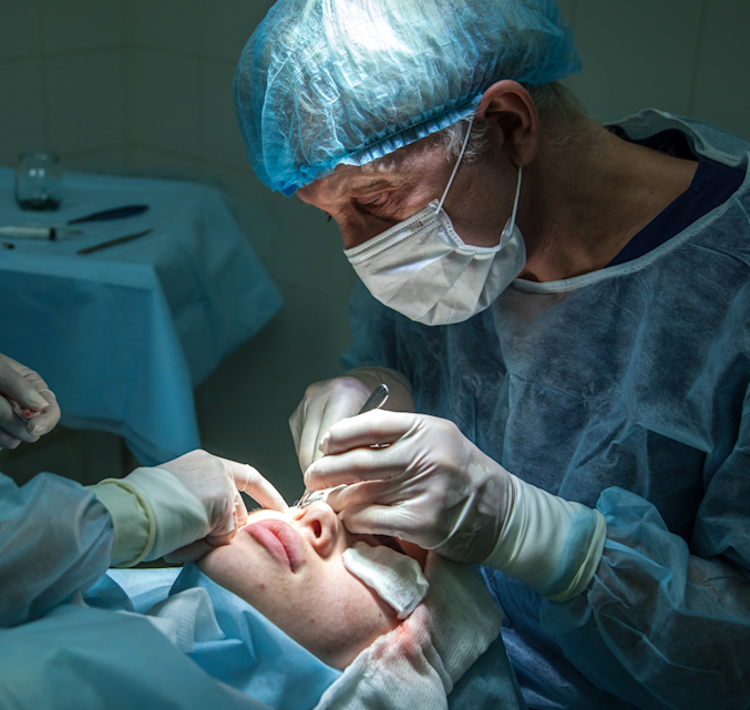eye surgeon performing surgery