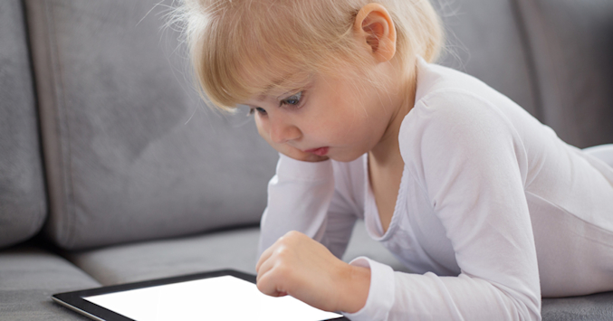child on ipad