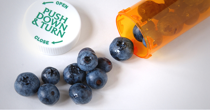 blueberries in a pill bottle