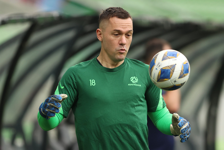 Vukovic steunt zijn voormalige teamgenoot om zijn plaats in de Socceroos . te verdedigen