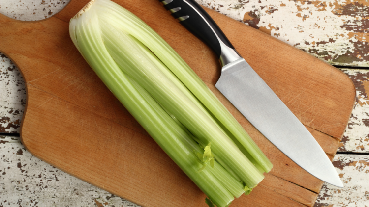 Celery prepared on cutting board