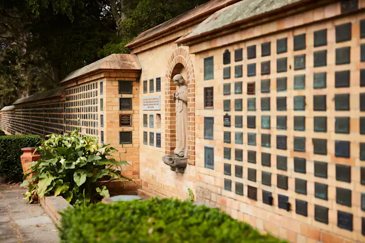 Bronze plaque and ashes interred in historical niche wall at Garden of Remembrance, Fawkner Memorial Park
