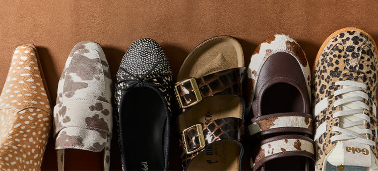 Six women's shoes in various styles and animal prints arranged in a row on a tan background, including flats, loafers, and sneakers.