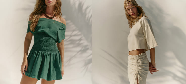 Two women modeling summer outfits: left wears green off-shoulder dress, right wears cream crop top and ruched skirt.