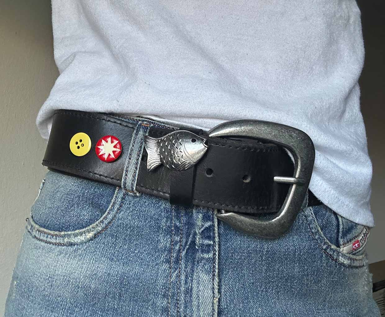 black and silver belt with charms