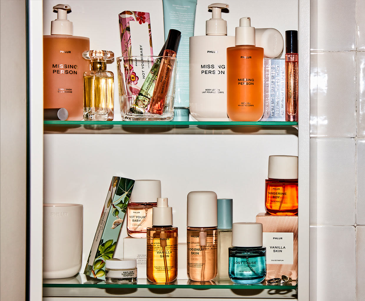 plur scent in bathroom cabinet