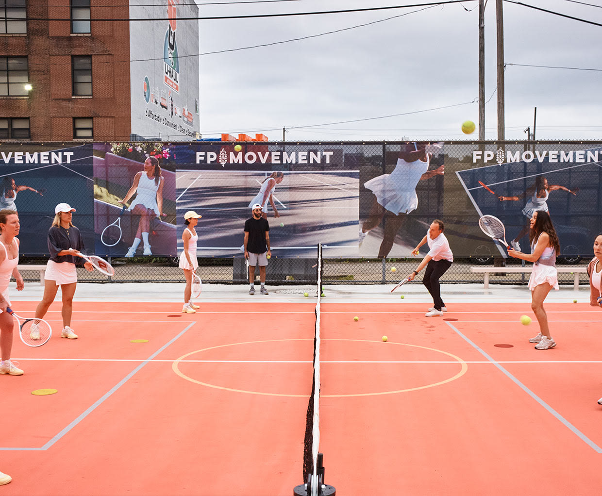 People playing on FP Movement tennis courts