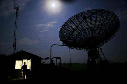 A student stands in the doorway of the control room for the 40-foot Telescope at the Green Bank Observatory
