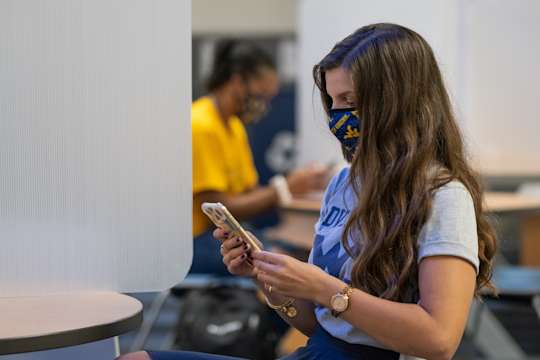 Student looking at her phone