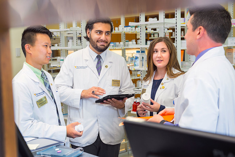 Student pharmacists working in the Mountaineer Pharmacy