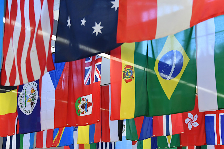 Flags from many different countries hang from the ceiling of the Mountainlair Student Union