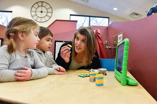 Student teaches children at the WVU Nursery School