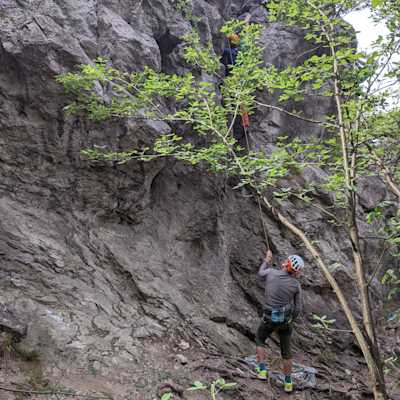 Christoph is climbing and I am belaying him from the ground.