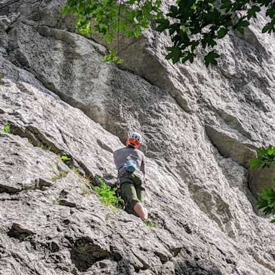 Me looking for the next hold on the rock.