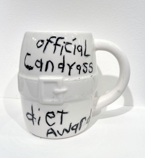 Cary Leibowitz
Official Candyass Diet Award, 2019
Glaze crayon on ceramic mug 
4.25 x 3 x 3 inches
10.8 x 7.6 x 7.6 cm