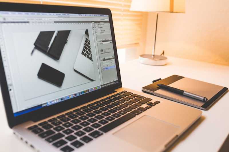 A Macbook using Photoshop