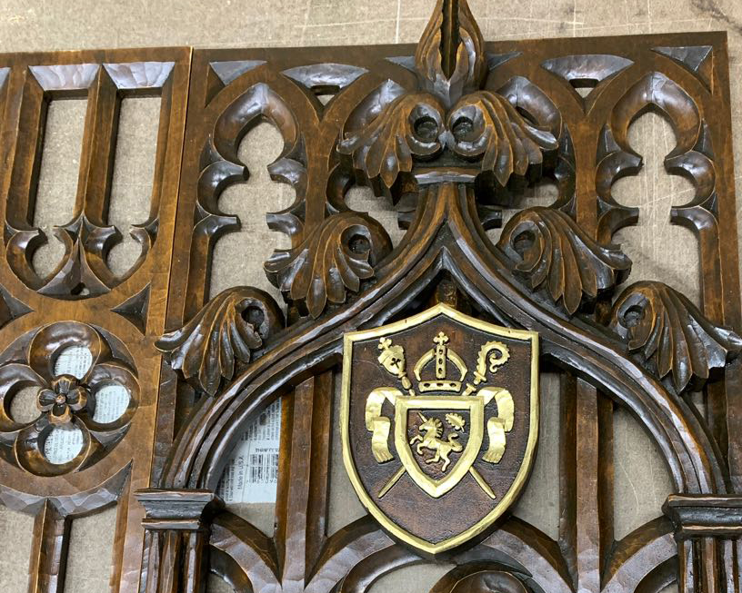 Cathedral crest on decorative wood frame