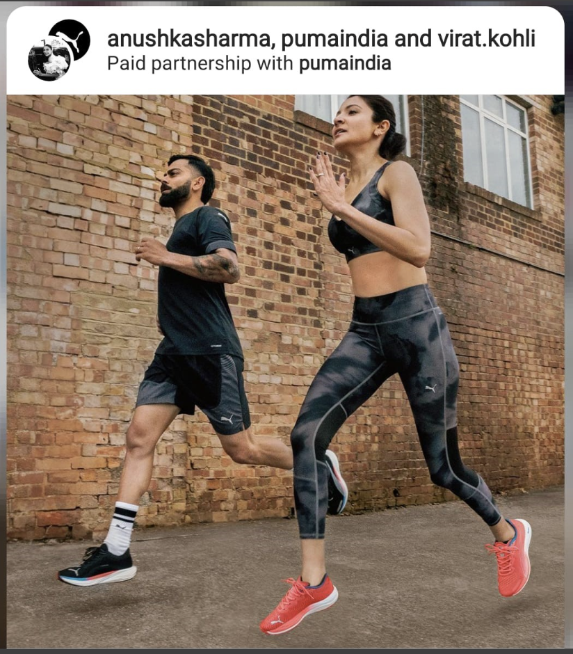 A sponsored Instagram post by PUMA India featuring the dynamic power couple, Virat Kohli and Anushka Sharma.