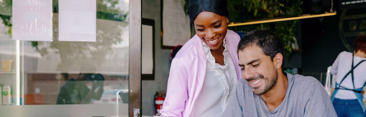 An IELTS candidate with learning difficulties is getting help from their buddy mentor.