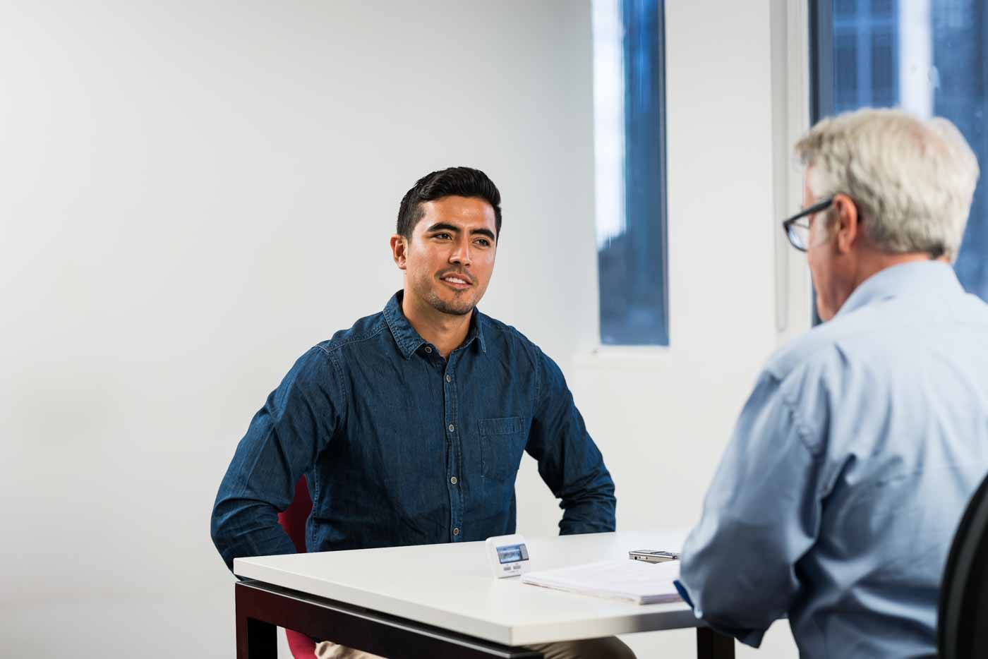 IELTS test taker having a conversation with the examiner