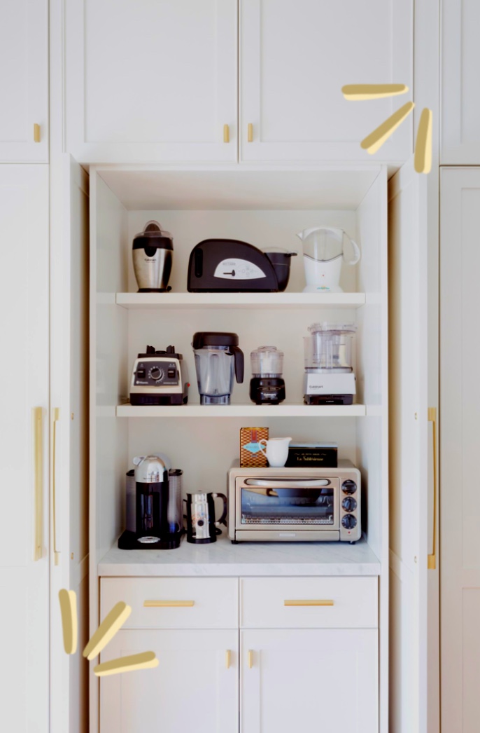 Appliances inside a kitchen cabinet