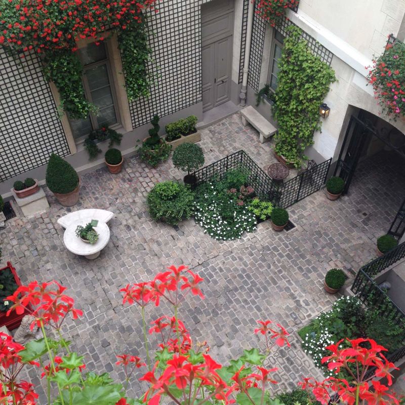 A garden court yard at Relais Christine, Paris