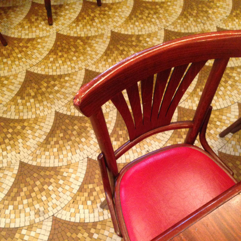 Red chair at Cafe de Flore, Paris