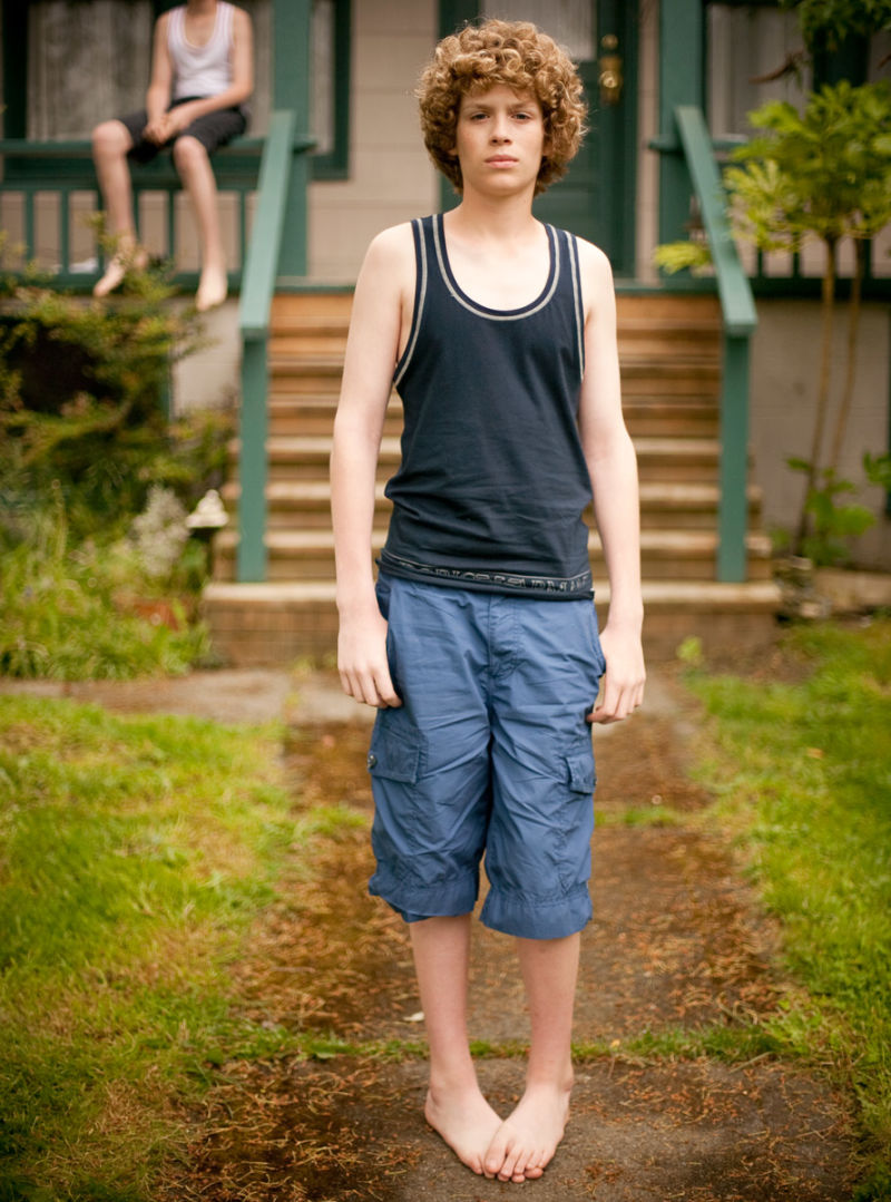 Boy in jeans and tank top