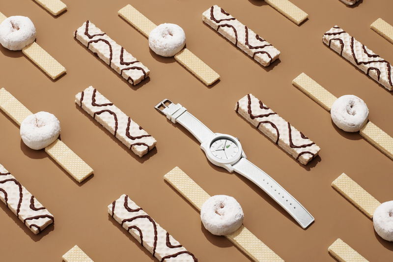 White Lacoste watch with cookies