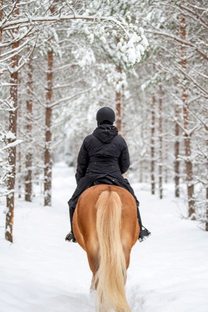 Winter riding outside through the snow 