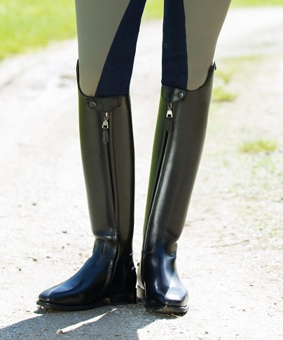Example of dressage boots on a rider.