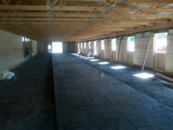 aisle way in newly built barn