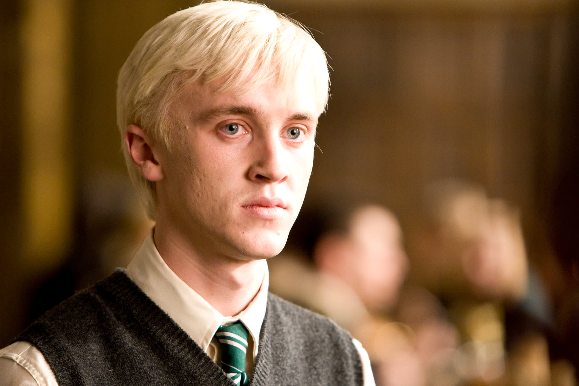 A close up image of Draco Malfoy looking concerned.