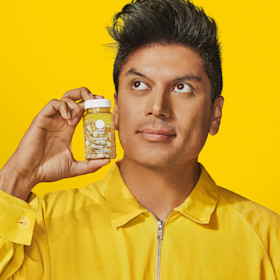Man holding Essential for Men 18+