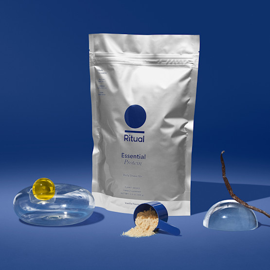 Photo of Ritual Essential Protein photographed against a blue backdrop