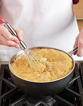 When you add the baking soda, the caramel will bubble and froth — keep whisking and it will diminish.