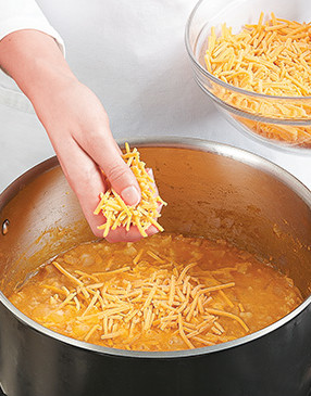 Add cheese and half-and-half near the end of cooking. Remove soup from heat once the cheese melts.