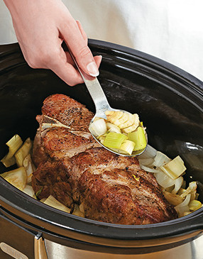 For the best flavor, add the sautéed vegetable mixture all around the sides of the pork.