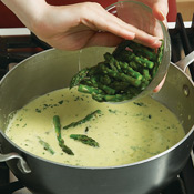 Add parsley and blanched asparagus tips just before serving. Don&rsquo;t heat the tips too long or they&rsquo;ll lose their color. 