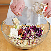 Prepare the slaw and set aside. Acidity in the vinegar and sour cream will soften the cabbage.