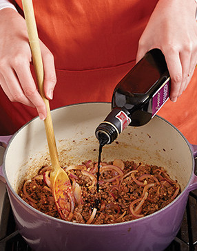 Deglaze the Dutch oven with a bit of balsamic vinegar, then reduce it to concentrate its flavor.